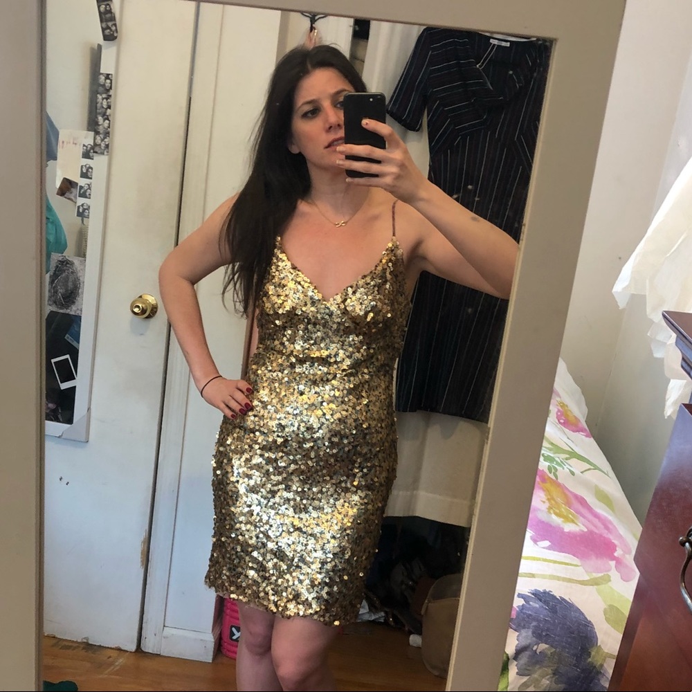 Gold sequined body con dress